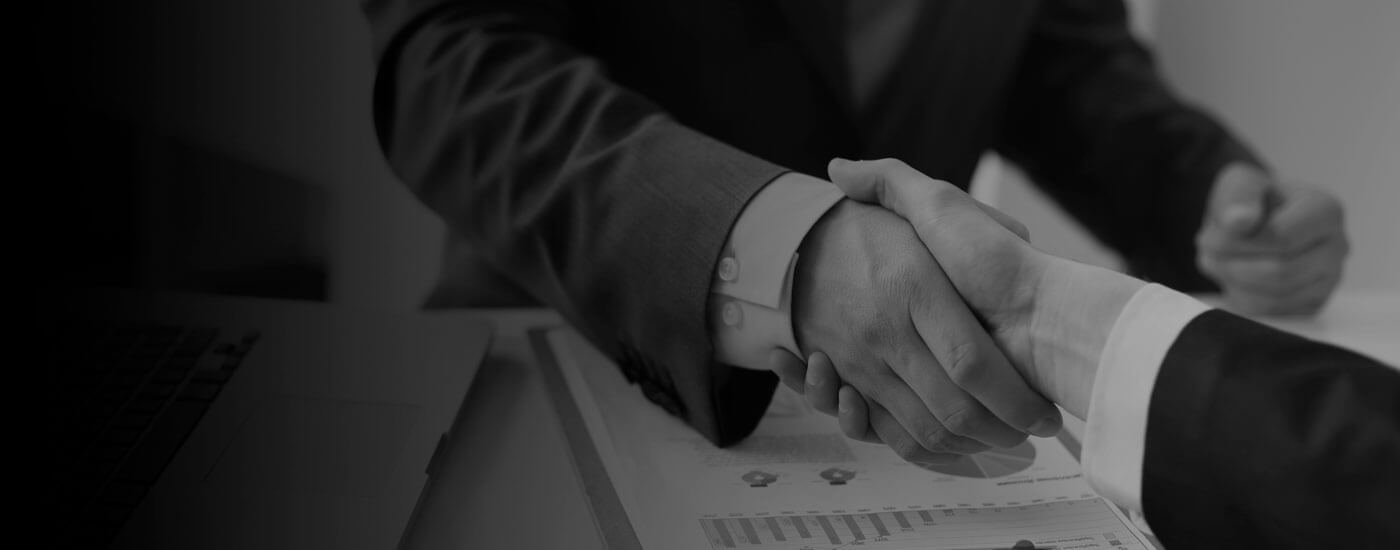 Businessmen shaking hands after discussing Business Owner Visas for migrate to Perth, Australia