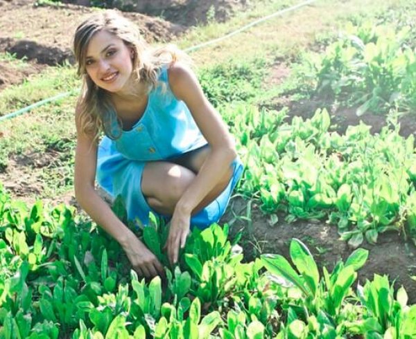 Young woman working in an agricultural farm