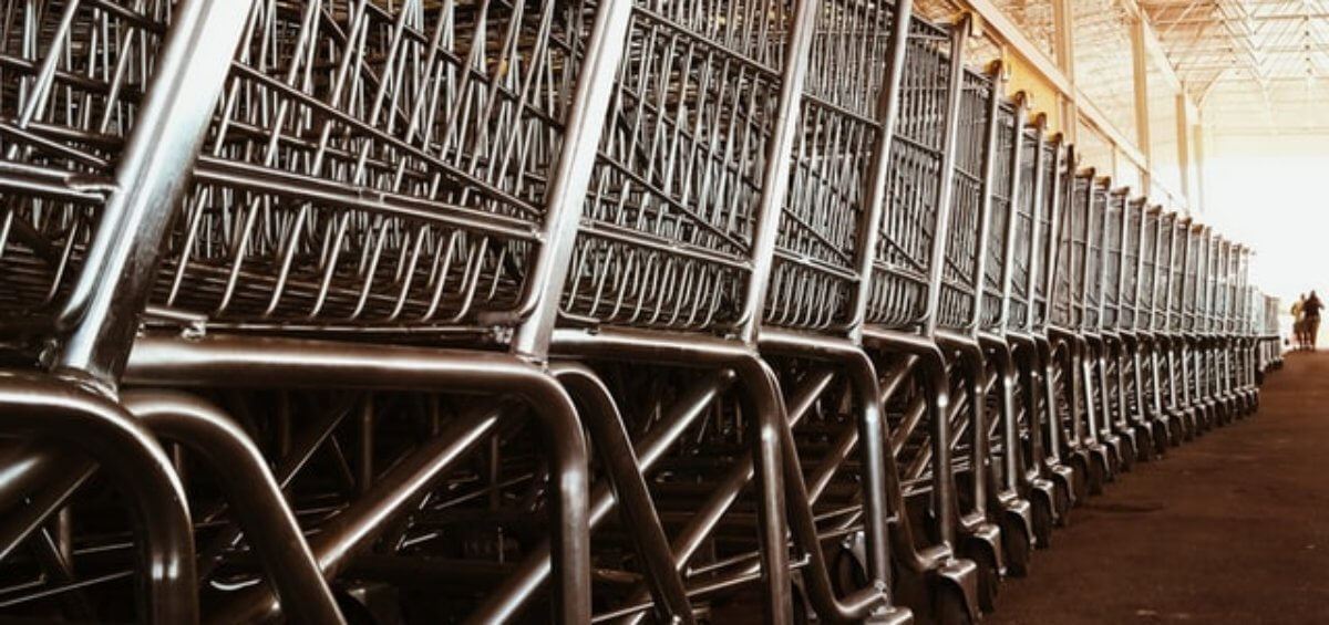 Trolleys within factory as student visa work hours are relaxed during COVID-19