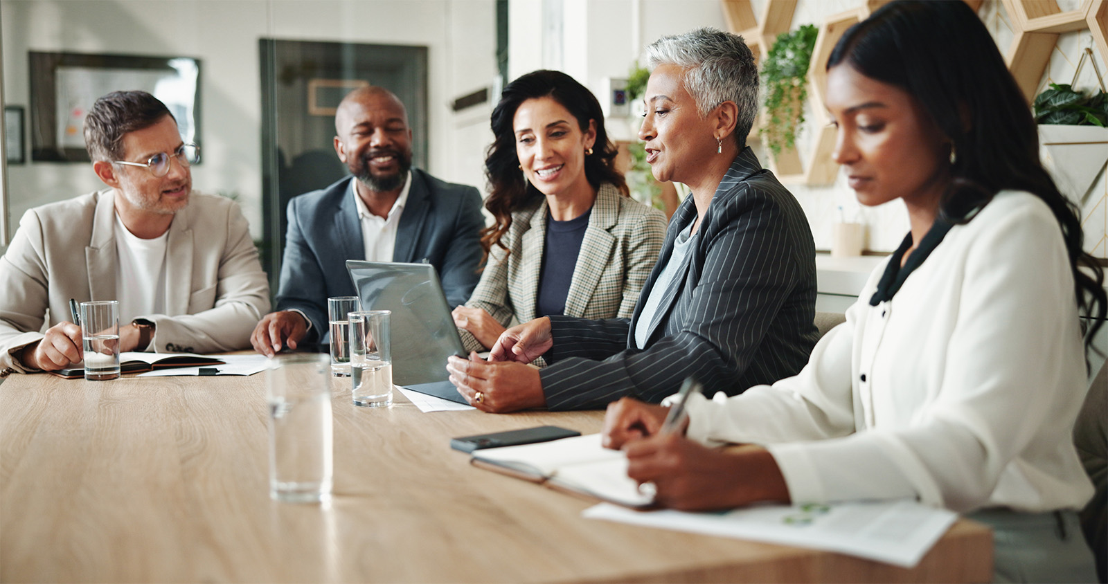 Business meeting with diverse participants.
